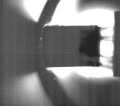 A 16 mm neon–deuterium pellet, indicated by an arrow, captured with a high speed camera as it travels from left to right at about 300 meters per second in a test stand at the Oak Ridge National Laboratory Pellet Lab.