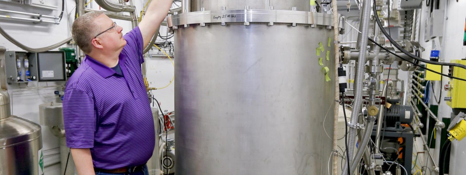 Robert Duckworth oversaw the testing of the 9-foot tall ITER cryoviscous compress pump prototype at the Spallation Neutron Source cryogenic test facility.