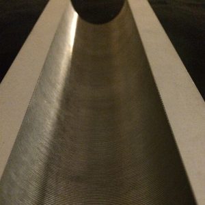 Evacuated wave guide with fine corrugations