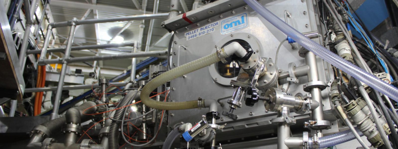 The Oak Ridge National Laboratory-developed pellet injector is installed on the DIII-D tokamak for fueling and plasma edge control experiments.