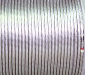 Superconducting strand is cabled at New England Wire Technologies on 2.5 meter wide by 2 meter tall spools before shipment to Florida for conductor jacketing.