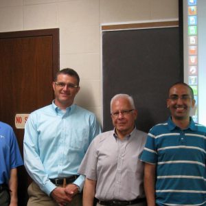 A neutronics model of ITER is behind (left to right) Ed Marriott, Tim Bohm, Paul Wilson, Mohamed Sawan and Ahmad Ibrahim, US ITER researchers at the University of Wisconsin.