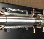 The electron cyclotron transmission lines feature multiple lines of aluminum waveguides (two small-scale prototypes are pictured).