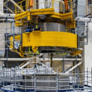 Third central solenoid module being lowered on to the stack