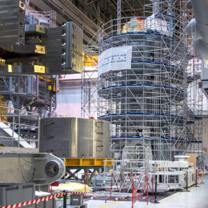 The fifth module, shown at the left of the central solenoid stack, arrived at the ITER site earlier this year, and the sixth module has just arrived in France from the United States. Photo: ITER Organization
